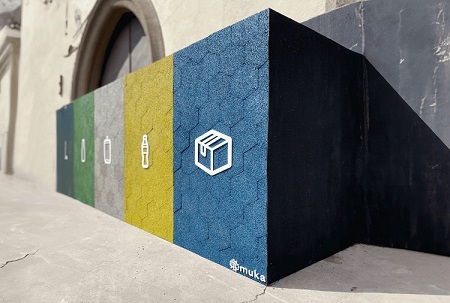 Contenedores de reciclaje con neumáticos usados reciclados