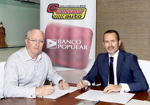Firma acuerdo Banco Popular y Confortauto